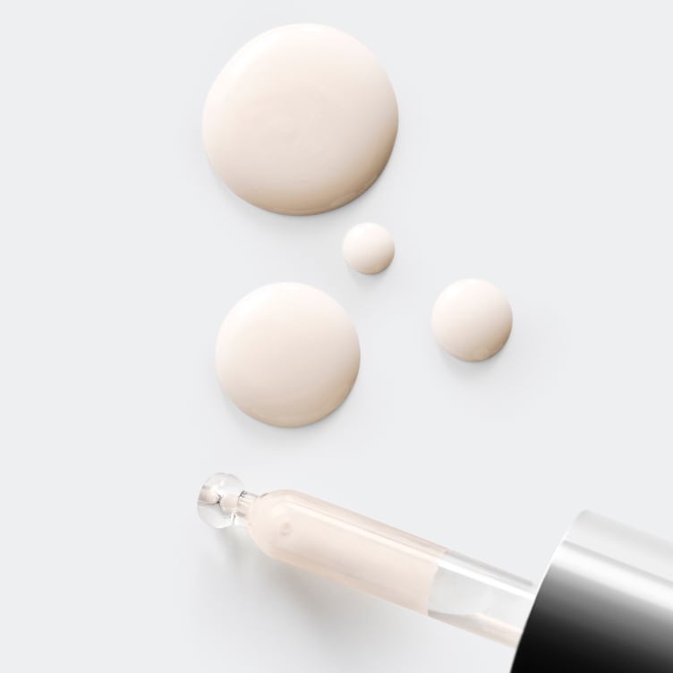 Serum dropper showing texture of Moisture Surge serum